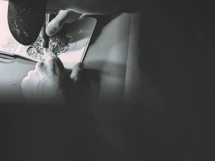 Billede af menneske, der laver linoleumsnit